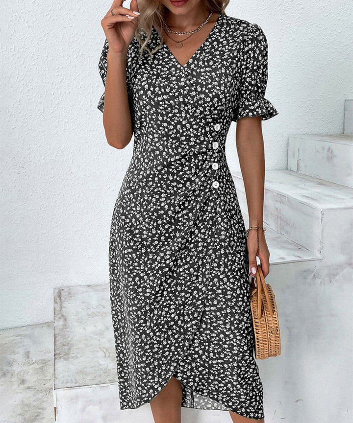 Nikki – Blommig Midiklänning med V-ringning