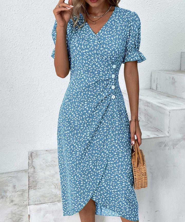 Nikki – Blommig Midiklänning med V-ringning