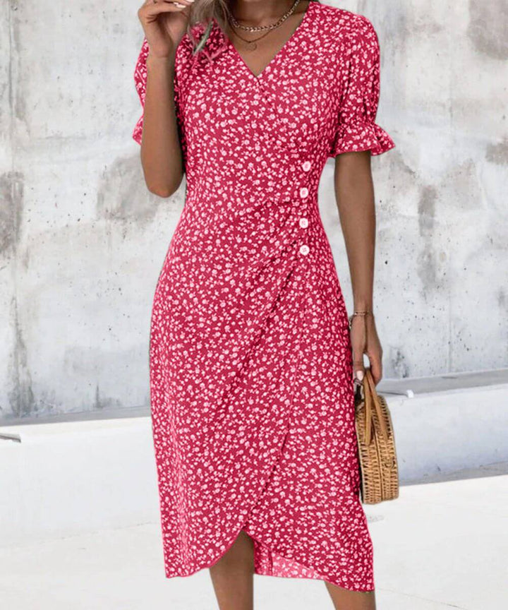 Nikki – Blommig Midiklänning med V-ringning